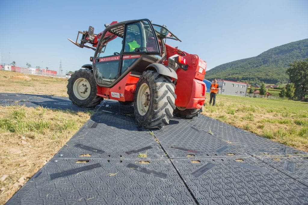 Telehandler driving on temporary ground-protection panels