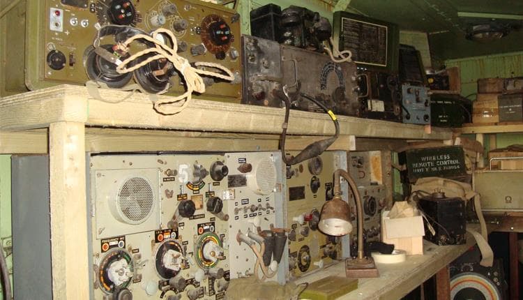 Historic military radio and communications equipment installed inside a vehicle